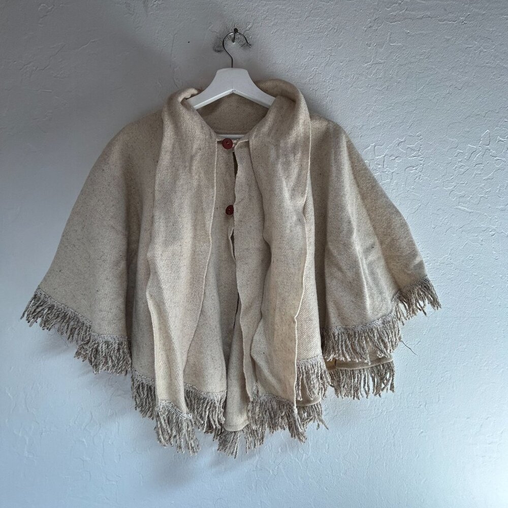 Vintage 90s Artilana Womens Wool Cape Poncho Wrap Jacket Cream Fringe Trim Woven